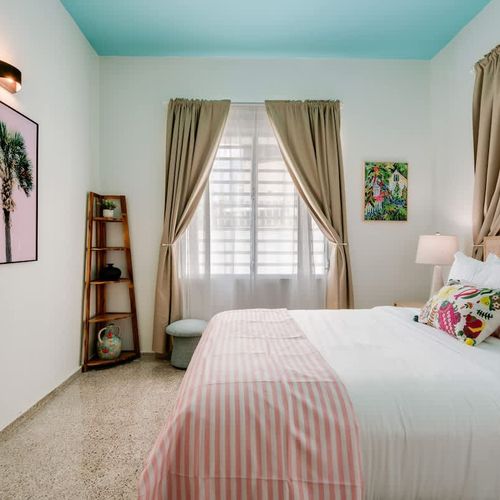 Simplicity and comfort combine in this minimalist bedroom, your perfect sanctuary.