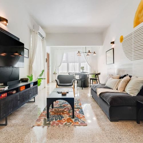 A cozy and stylish living area, designed for relaxation and comfort after a day of exploring.