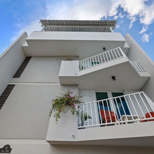 Relax and unwind, your peaceful oasis awaits on our sunny balcony!