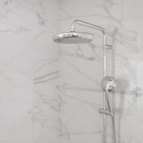 Invigorating rainfall shower in a sleek, modern bathroom.