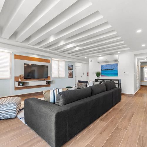 Our spacious living room is the ideal spot for relaxation and entertainment.