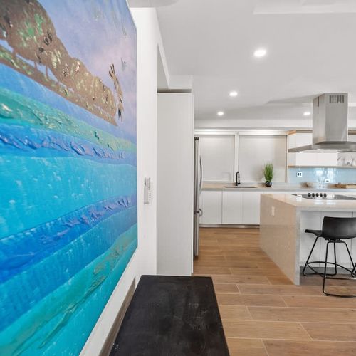 A glimpse of the kitchen and dining area.