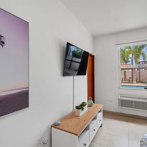 A comfortable sofa and elegant design create a perfect space to relax.