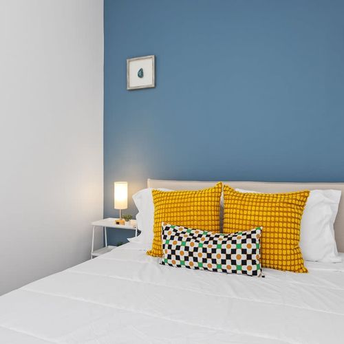 Modern Oasis: Discover a serene retreat in this stylish bedroom, where contemporary design meets exceptional comfort, offering a perfect blend of elegance and relaxation.