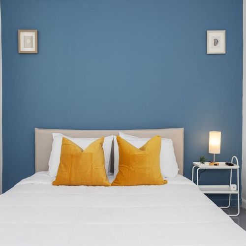 Dreamy Comfort: Experience true comfort in this beautifully appointed bedroom, complete with a luxurious bed and tasteful, contemporary furnishings that invite you to relax and recharge.