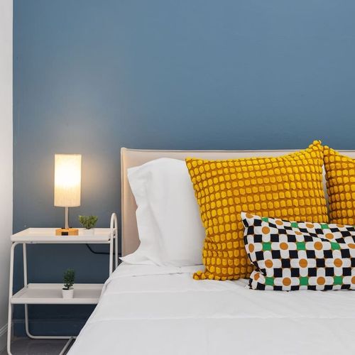 Your Personal Sanctuary: Escape to this exquisite bedroom, meticulously styled with a discerning eye for comfort and aesthetics, ensuring a serene and memorable stay.