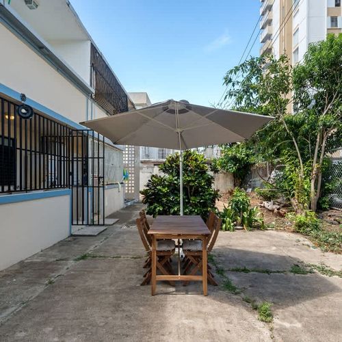 Indoor-outdoor living: Extend your relaxation to this comfy spot.