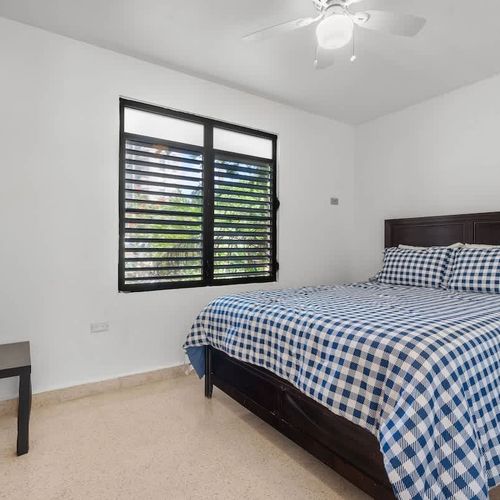 Light & airy: A tranquil space with charming island shutters.