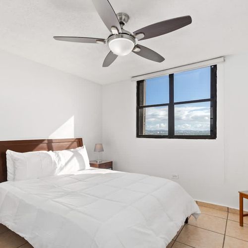 Serene bedroom with stunning views, perfect for unwinding.