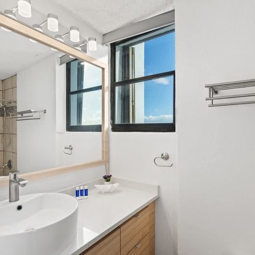 Modern bathroom vanity with ample counter space.