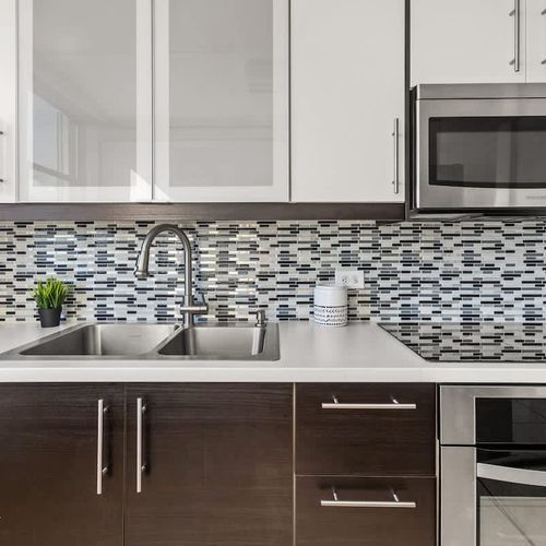 Prepare meals with ease on spacious, clean countertops.