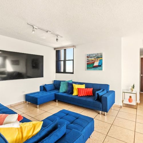 Spacious living room, ideal for entertainment or relaxation.