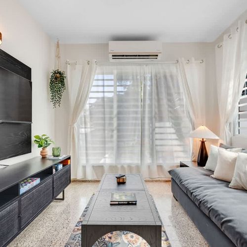 Sink into the comfortable sofa and enjoy a moment of peace.