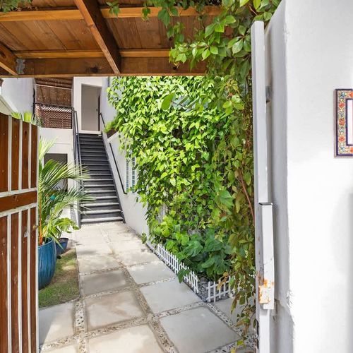 Follow this charming, green pathway to find your private retreat.