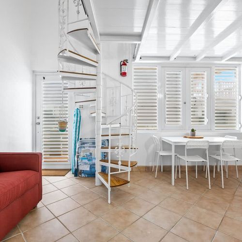 A perfect spot for dining next to a fully equipped kitchen.