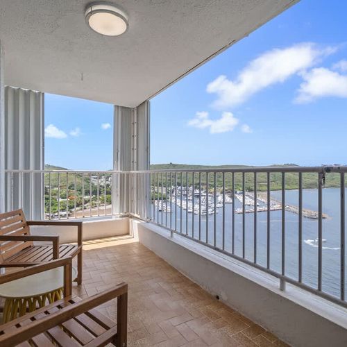 "Sip your morning coffee with an unparalleled view! Our expansive private balcony offers a direct, unobstructed panorama of the turquoise ocean and the serene coastline. Your personal front-row seat to paradise.