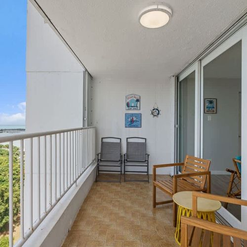 "Your private outdoor oasis! This inviting balcony features comfortable seating, offering a perfect spot to enjoy your morning coffee, read a book,
