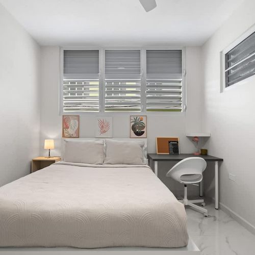 Tranquil bedroom with bright light. Perfect oasis after a day out.