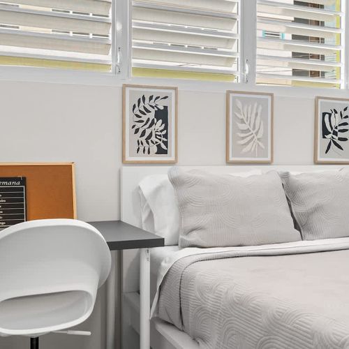 Unwind in this bright, calming space with ample comfort.