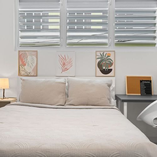 Premium linens and thoughtful decor create a restful oasis.