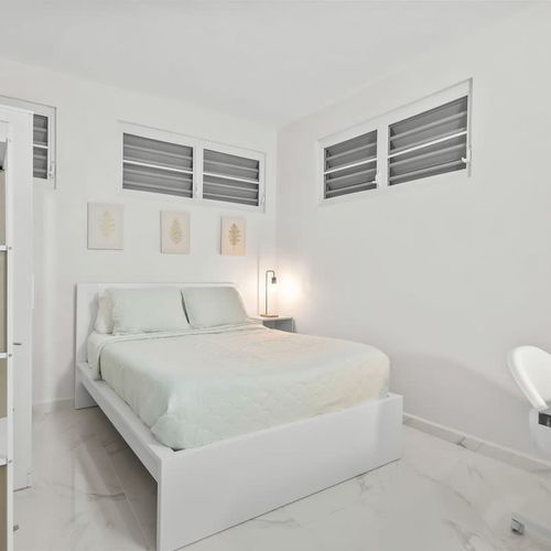 Minimalist chic bedroom. Serene escape after a long day.