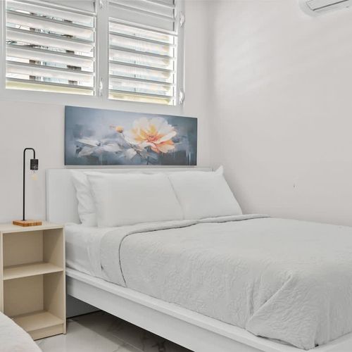 Perfect setup for reading or working from bed. Cozy feel.