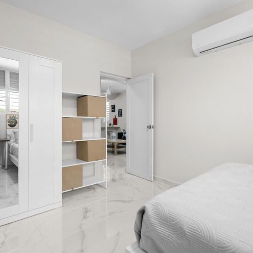 A peaceful retreat with ample storage and comfort.