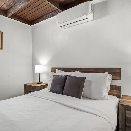 Peaceful bedroom ambiance; refreshing decor.