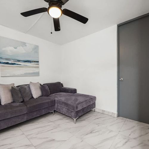 Relax in the stylish, cozy living room.