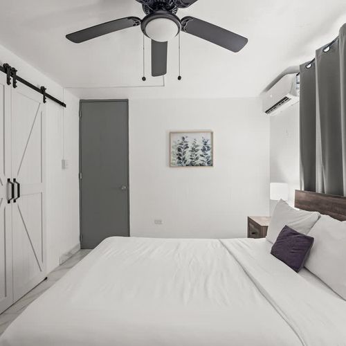 Large Master Bedroom with ample storage.