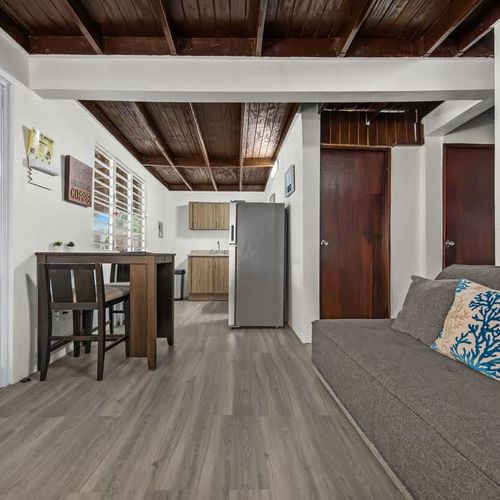 Efficient kitchen with modern white cabinetry.