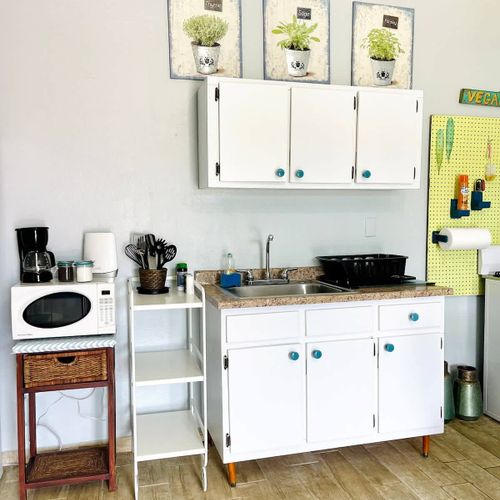 Designed for practicality and comfort: This functional kitchen setup provides guests with the option to prepare their own meals, enhancing the flexibility of your stay.