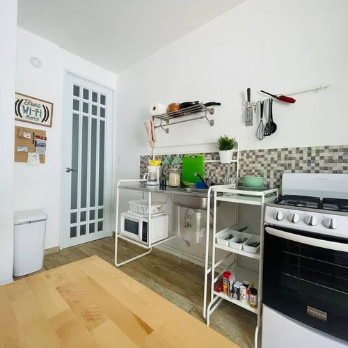 Unleash your inner chef in our fully equipped kitchen! Complete with a stove, pans, cutlery, utensils, and a microwave, you'll have everything you need to prepare delicious meals.