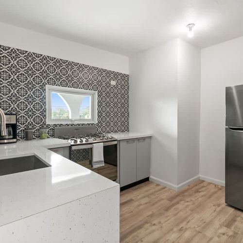 A well-designed kitchen, perfect for preparing meals during your stay.