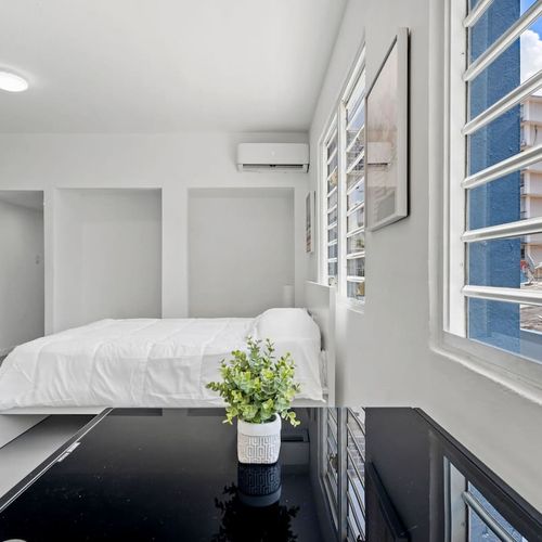 Awaken to the gentle embrace of morning light in this sun-kissed room, where the sun's golden rays dance across the walls, infusing the space with warmth and inviting you to start your day in a peaceful ambiance.