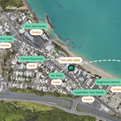 The map showcases the vibrant location of GoldenBeach 502. It highlights the stunning beaches, restaurants, shops and café. The overall design features a tropical aesthetic, inviting travelers to explore this beautiful beachfront destination.
