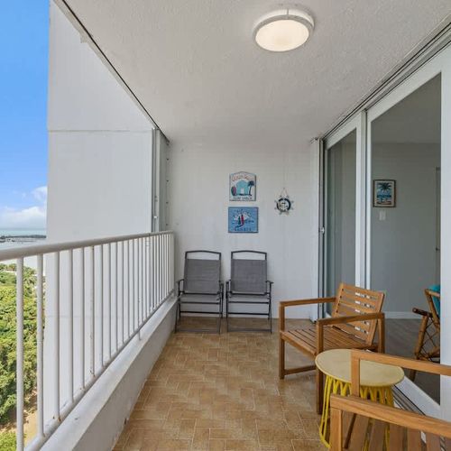 "Your private outdoor oasis! This inviting balcony features comfortable seating, offering a perfect spot to enjoy your morning coffee, read a book,
