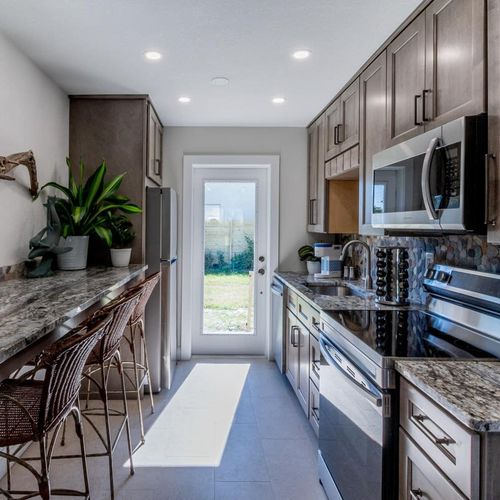 The fully equipped kitchen has everything you need to feel at home, including a microwave and dishwasher. Ask us about our concierge services and arrive to a fully stocked fridge!