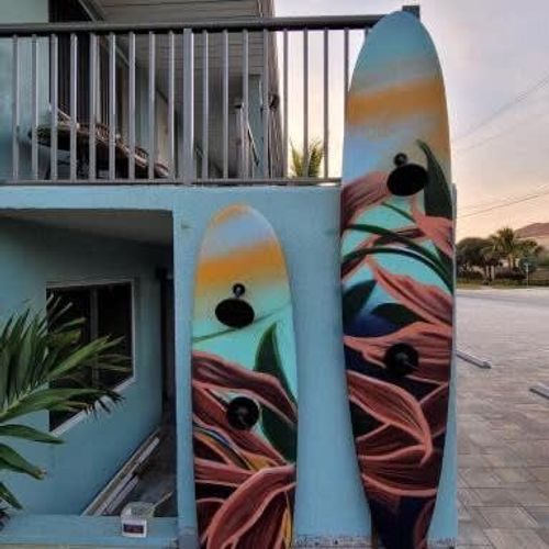 You may not have noticed it in the first photo – while you can't take these surf boards for a ride, they double as your outdoor showers! Wash the sand away before you quickchange into your favorite dinner outfit, and off you go.