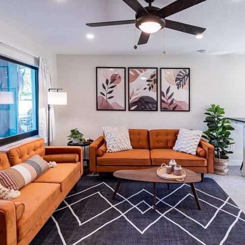 Meant to help you relax and get out of the sun, the living room is complete with a ceiling fan and comfortable modern furniture.