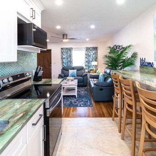 The kitchen opens onto the living room to maximize your sense of expansiveness and flow.