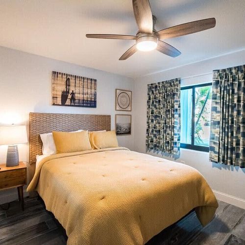 No less thoughtfully put together, the queen bedroom offers bright views and cozy comfort.