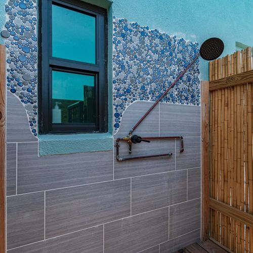 Rinse off from the pool, or wash away the sand, this outdoor shower is private to you!