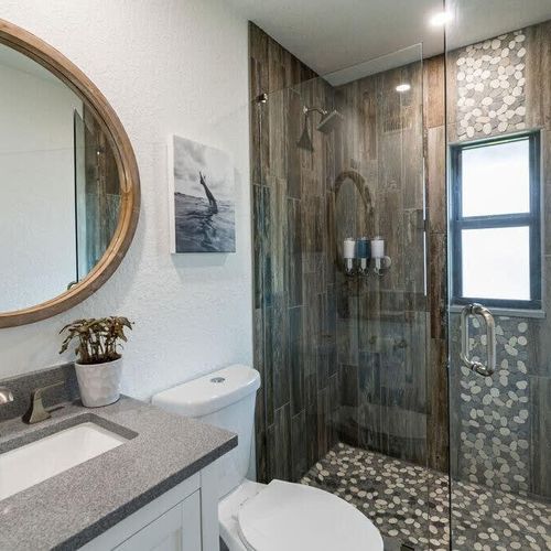 This bright and sleek bathroom offers a large, walk-in shower to refresh after a good night's sleep. Unless you choose to bring your own, Beachside VR provides shampoo, conditioner and body wash for your convenience. And if you're coming from the beach th