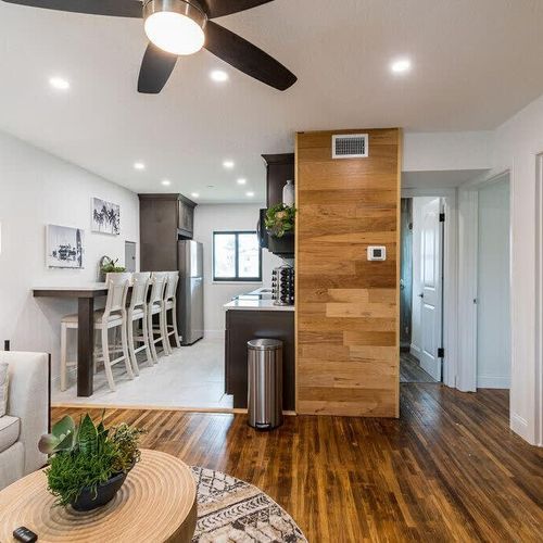 Here, the kitchen opens onto the living room to maximize your sense of expansiveness and flow.