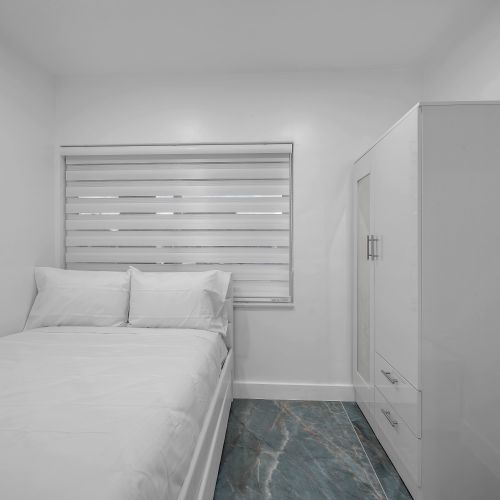 Bedroom 2 also features a comfortable full-sized pull-out bed and a spacious closet for your storage needs.