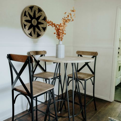 Take a seat and relax while you do your laundry in this comfortable laundry area.