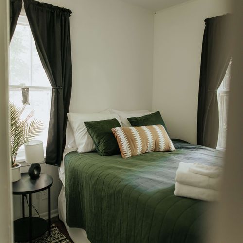 This elegantly designed cozy bedroom is perfect for a restful night after a long day.