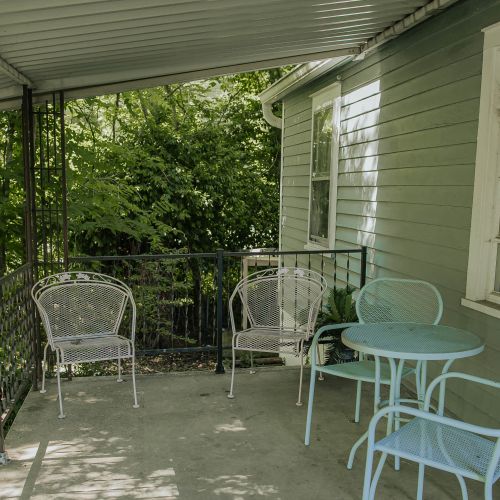 Grab a seat and relax on this porch.