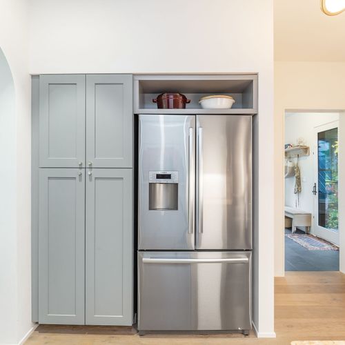 A serene kitchen that combines beauty and comfort for your cooking needs.